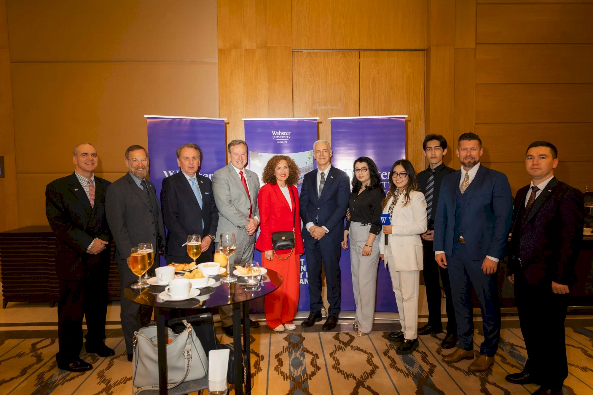 Guests standing in groups at a chamber business mixer