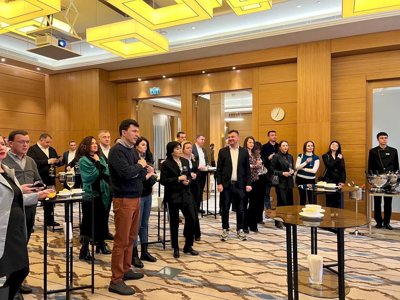 Guests in conversation at a chamber reception