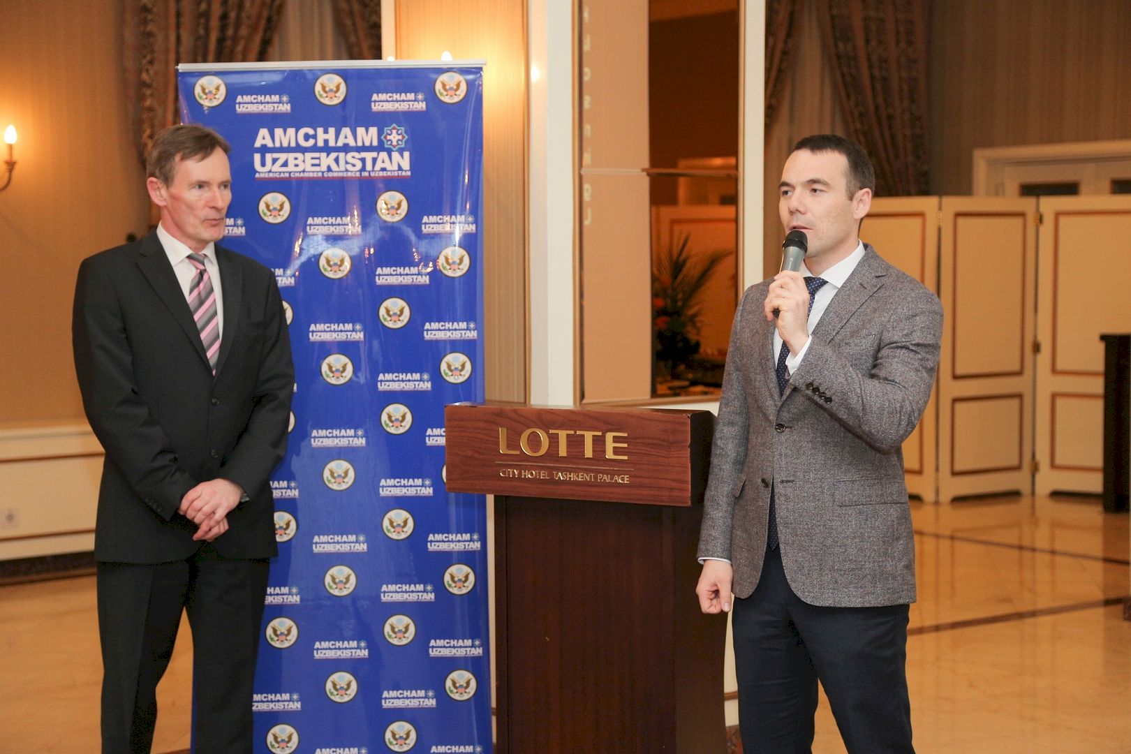 Guests standing in groups at a chamber business mixer